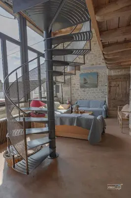 Coin salon dans l'établissement Demeure atypique - ancienne loge