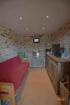 Télévision ou salle de divertissement dans l'établissement Demeure atypique - ancienne loge