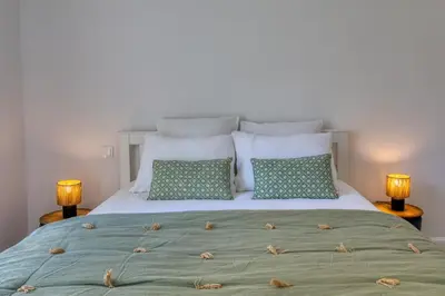 Un ou plusieurs lits dans un hébergement de l'établissement Maison T3 tout confort et spa Le Clos des Pierres