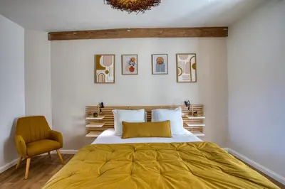 Un ou plusieurs lits dans un hébergement de l'établissement Maison T3 tout confort et spa Le Clos des Pierres