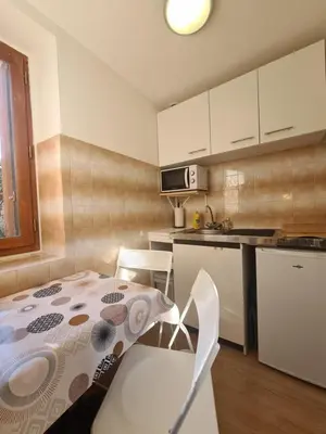 Cuisine ou kitchenette dans l'établissement Le Citrus