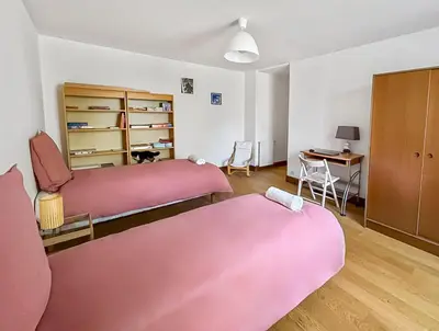 Un ou plusieurs lits dans un hébergement de l'établissement Maison de caractère au cœur du Périgord