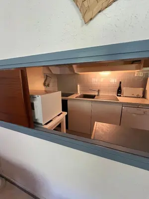 Cuisine ou kitchenette dans l'établissement Loue appartement au Mont Dore AUVERGNE