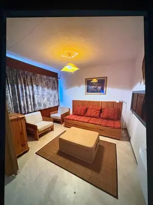 Coin salon dans l'établissement Loue appartement au Mont Dore AUVERGNE