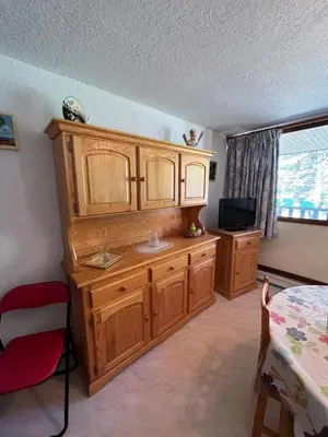 Télévision ou salle de divertissement dans l'établissement Loue appartement au Mont Dore AUVERGNE