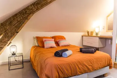 Un ou plusieurs lits dans un hébergement de l'établissement Villa Chadourne - LE CONQUERANT T2 Moderne