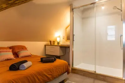 Un ou plusieurs lits dans un hébergement de l'établissement Villa Chadourne - LE CONQUERANT T2 Moderne