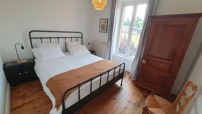 Un ou plusieurs lits dans un hébergement de l'établissement Maison Valentine