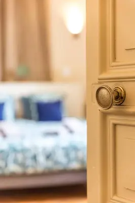Un ou plusieurs lits dans un hébergement de l'établissement Villa Chadourne - Chambre Accords