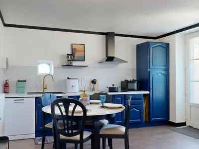 Cuisine ou kitchenette dans l'établissement Cosy Avec Sauna et Spa Privatif