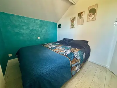 Un ou plusieurs lits dans un hébergement de l'établissement Petite maison de campagne