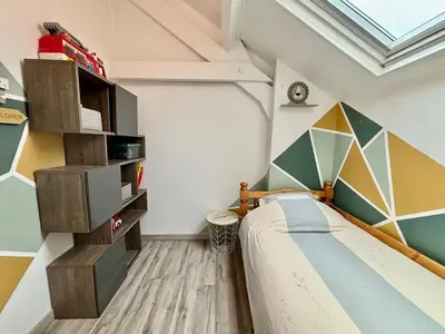 Un ou plusieurs lits dans un hébergement de l'établissement Petite maison de campagne