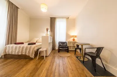 Un ou plusieurs lits dans un hébergement de l'établissement Villa Chadourne - La Cle Perdue - Studio