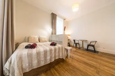 Un ou plusieurs lits dans un hébergement de l'établissement Villa Chadourne - La Cle Perdue - Studio