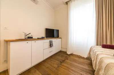 Télévision ou salle de divertissement dans l'établissement Villa Chadourne - La Cle Perdue - Studio
