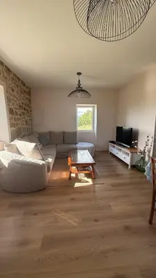 Coin salon dans l'établissement Le Calme du Verdier - Villa