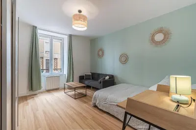 Coin salon dans l'établissement Le Nid Emeraude - Welc'Home