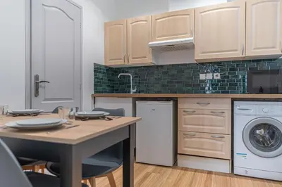 Cuisine ou kitchenette dans l'établissement Le Nid Emeraude - Welc'Home