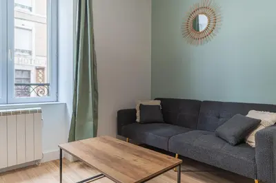 Coin salon dans l'établissement Le Nid Emeraude - Welc'Home