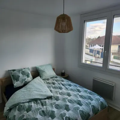 Un ou plusieurs lits dans un hébergement de l'établissement Appartement 2 pièces a 5 min du centre de Limoges