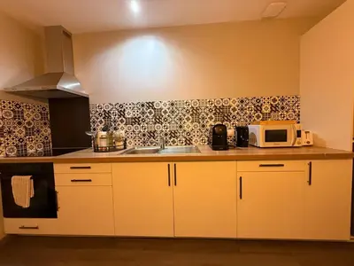 Cuisine ou kitchenette dans l'établissement L'Industrielle - Cozy & central - Close to train station
