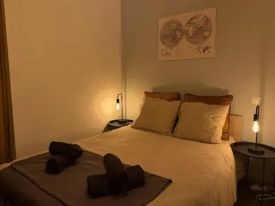 Un ou plusieurs lits dans un hébergement de l'établissement L'Industrielle - Cozy & central - Close to train station