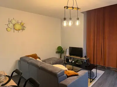 Télévision ou salle de divertissement dans l'établissement L'Industrielle - Cozy & central - Close to train station