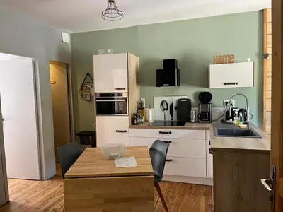 Cuisine ou kitchenette dans l'établissement Chaleureux et cosy-emplacement idéal - 4 pers