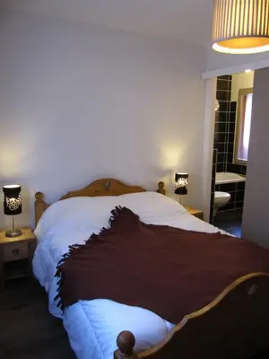 Un ou plusieurs lits dans un hébergement de l'établissement Chalet camp de base pour tribu sportif wifi 5 ch
