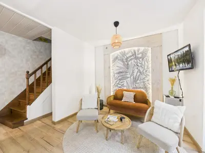 Coin salon dans l'établissement Jolie maison pour 4 à proximité du centre