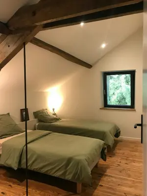 Un ou plusieurs lits dans un hébergement de l'établissement The Grange In Cantal