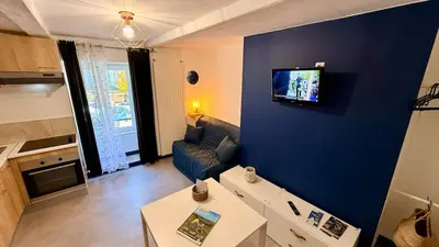 Télévision ou salle de divertissement dans l'établissement Les Cimes au cœur du Massif du Sancy