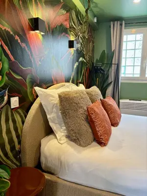 Un ou plusieurs lits dans un hébergement de l'établissement Casa Jungle - Le Studio Végétal - Confort & Design