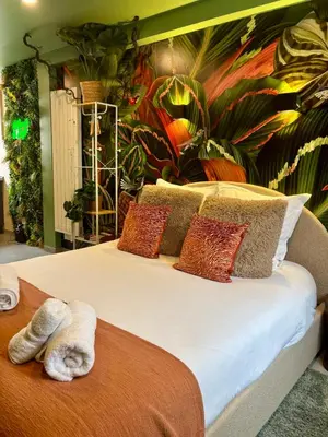 Un ou plusieurs lits dans un hébergement de l'établissement Casa Jungle - Le Studio Végétal - Confort & Design
