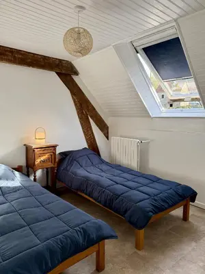 Un ou plusieurs lits dans un hébergement de l'établissement Maison Équilibre