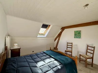 Un ou plusieurs lits dans un hébergement de l'établissement Maison Équilibre