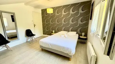 Un ou plusieurs lits dans un hébergement de l'établissement Le refuge, Wifi, Parking privé, Proche Limoges, terrasse, jardin