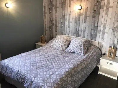 Un ou plusieurs lits dans un hébergement de l'établissement Chez Mireille, au coeur du Sancy