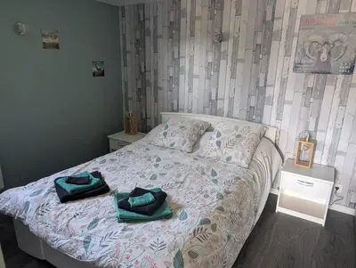 Un ou plusieurs lits dans un hébergement de l'établissement Chez Mireille, au coeur du Sancy