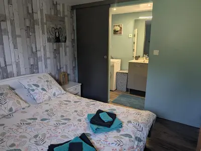 Un ou plusieurs lits dans un hébergement de l'établissement Chez Mireille, au coeur du Sancy