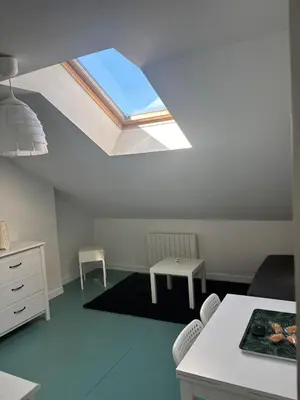 Un ou plusieurs lits dans un hébergement de l'établissement Studio proche centre ville