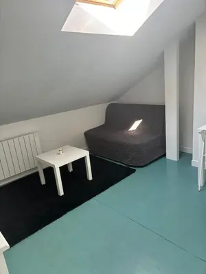 Un ou plusieurs lits dans un hébergement de l'établissement Studio proche centre ville