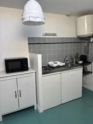 Cuisine ou kitchenette dans l'établissement Studio proche centre ville