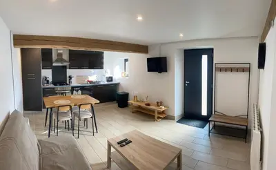 Télévision ou salle de divertissement dans l'établissement Maison Gîtes de l'étang caché