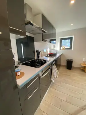 Cuisine ou kitchenette dans l'établissement Maison Gîtes de l'étang caché