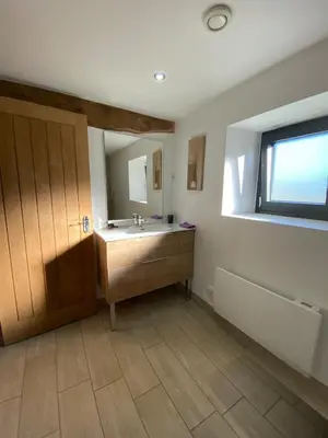Un ou plusieurs lits dans un hébergement de l'établissement Maison Gîtes de l'étang caché