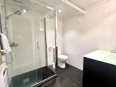 Salle de bains dans l'établissement Appartement cosy avec jardin - Stationnement gratuit