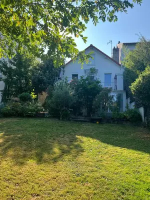 Jardin de l'établissement Appartement cosy avec jardin - Stationnement gratuit