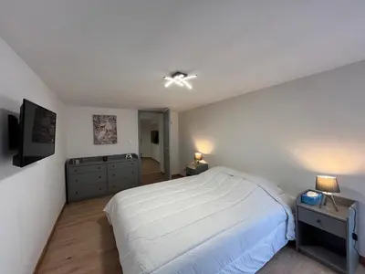 Un ou plusieurs lits dans un hébergement de l'établissement Spacieux Duplex à La Bourboule, 87m² pour 6 pers. - FR-1-608-296