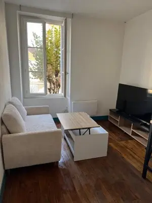 Télévision ou salle de divertissement dans l'établissement Bel Appartement T2